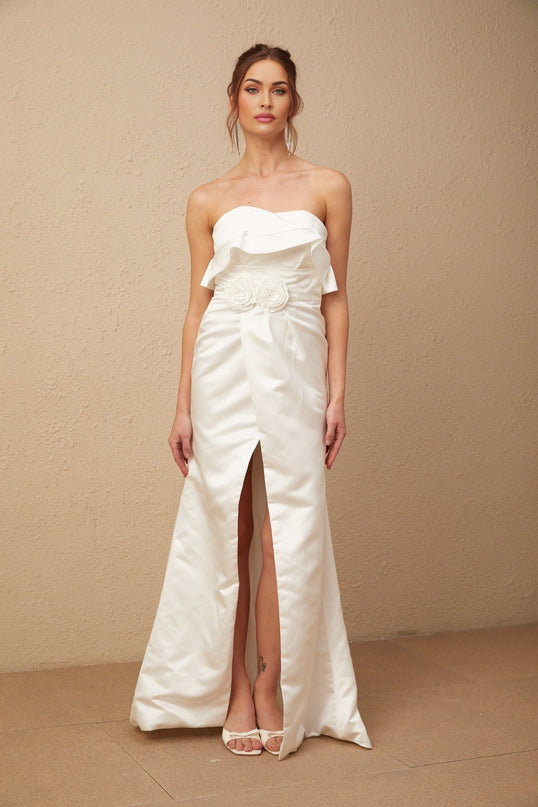 Amelia White Glossy Satin Maxi Dress with Off-Shoulder Cut and Floral Appliqué