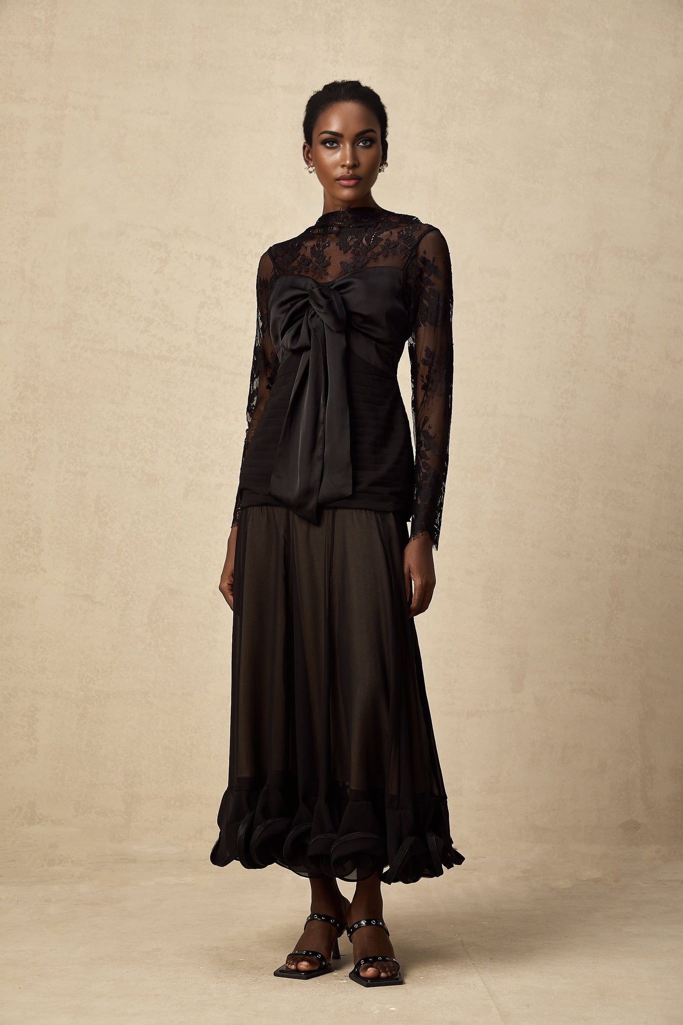 Amélie black midi dress with sheer floral lace panels and sleeves