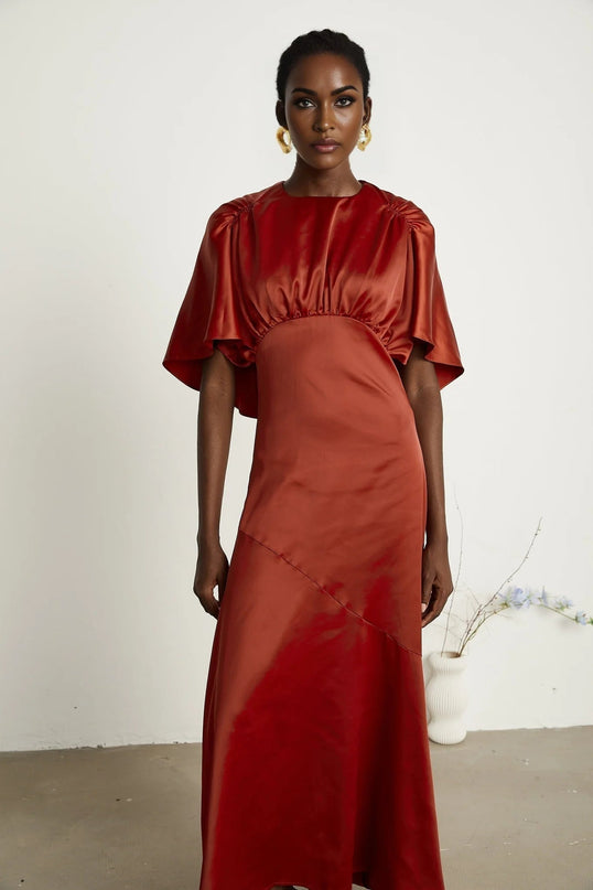 Amelina Red Satin Maxi Dress Crew Neck Cape Sleeves Gathered Detailing Fitted Waist Open Back Asymmetric Hem Rear Zip Fastening Viscose Elegant Sophisticated Luxurious Chic Statement Special Occasion Opulence Comfort