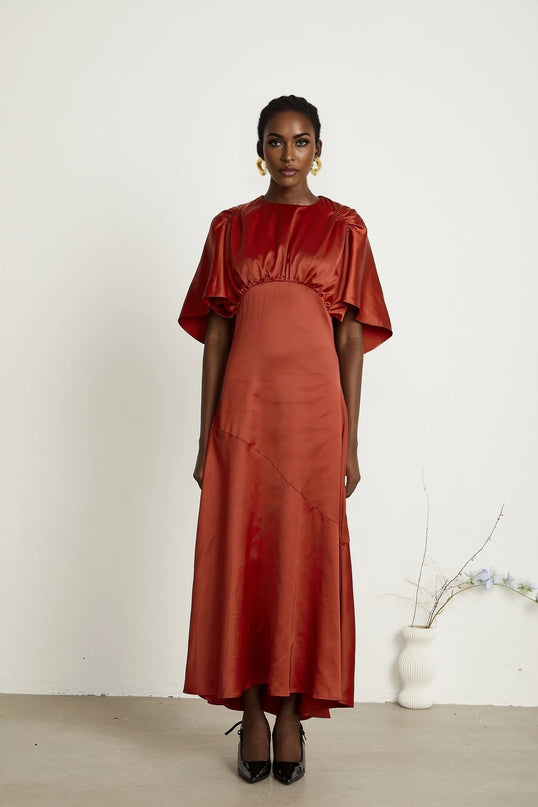 Amelina Red Satin Maxi Dress Crew Neck Cape Sleeves Gathered Detailing Fitted Waist Open Back Asymmetric Hem Rear Zip Fastening Viscose Elegant Sophisticated Luxurious Chic Statement Floor-Length Special Occasion