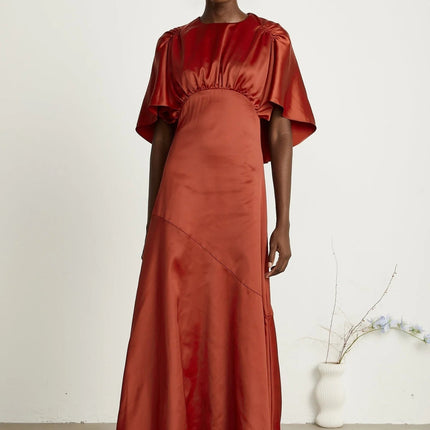 Amelina Red Satin Maxi Dress Crew Neck Cape Sleeves Gathered Detailing Fitted Waist Open Back Asymmetric Hem Rear Zip Fastening Viscose