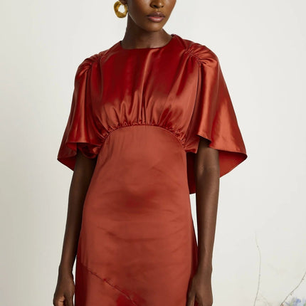 Amelina Red Satin Maxi Dress Crew Neck Cape Sleeves Gathered Detailing Fitted Waist Open Back Asymmetric Hem Rear Zip Fastening Viscose