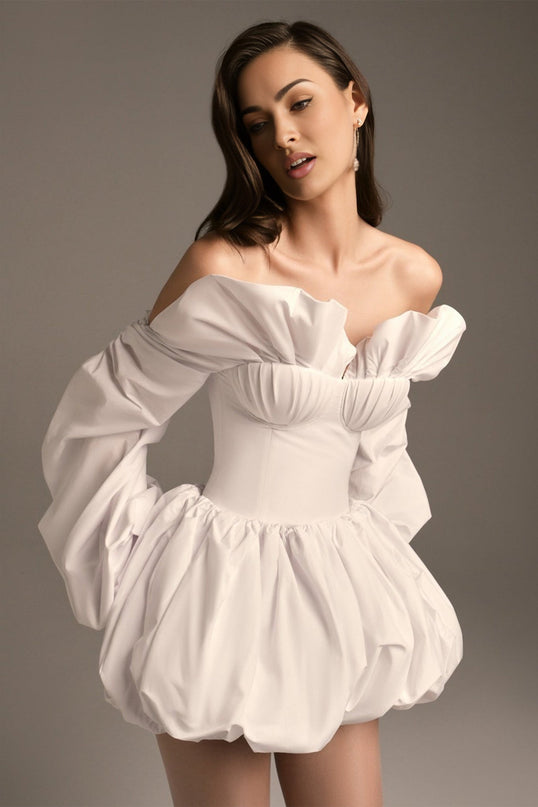 Amy Blouse in White off-shoulder 100% Cotton shell-shaped chest cup long puff sleeves ruched detailing rear lace-up fastening cropped silhouette sophistication style versatile elegance grace