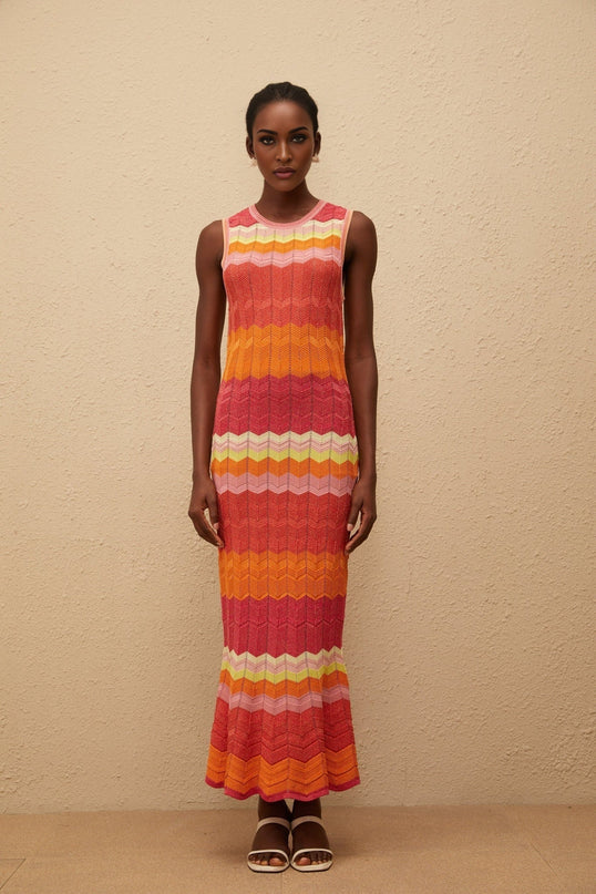 Andrea Maxi Dress in Coral Pink wavy knit metallic threading round neck fitted waistline flared hem ankle-length