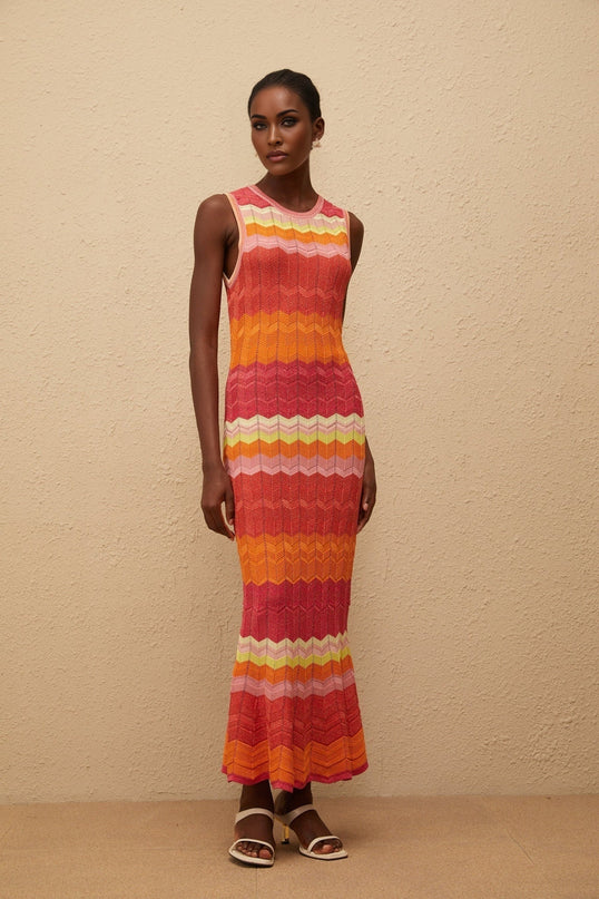 Andrea Maxi Dress in Coral Pink wavy knit metallic threading round neck fitted waistline flared hem ankle-length