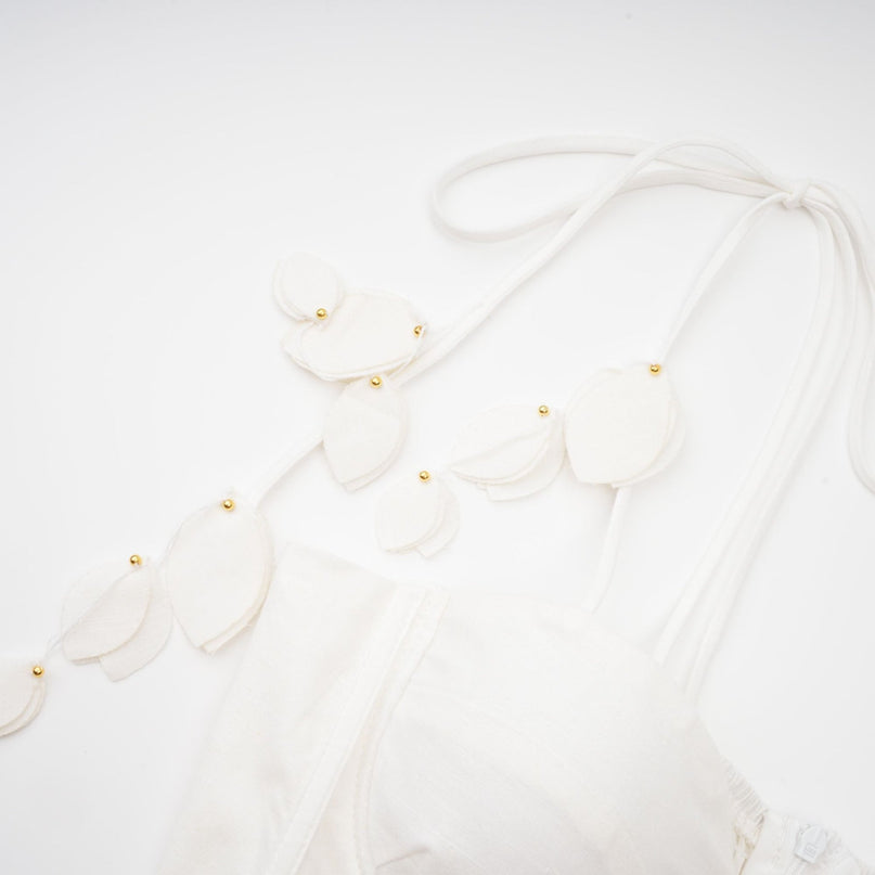 Andromeda White Midi Dress Sweetheart Neckline Bustier Style Rouleau Straps Waist Tie Side Pockets Rear Zip Midi Length
