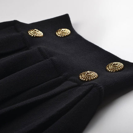 Angel wearing Black High Waisted Flared Pleated Skirt with Gold Button Accents