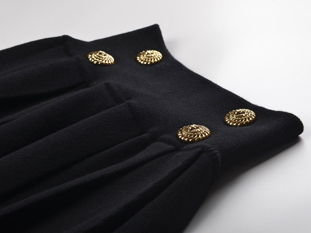 Angel wearing Black High Waisted Flared Pleated Skirt with Gold Button Accents