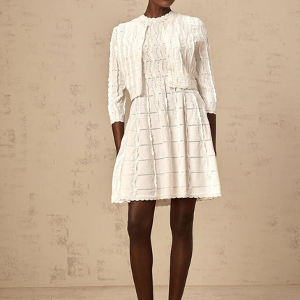 Angela White Knitted Cardigan with Scalloped Hem and Ruffled Detailing