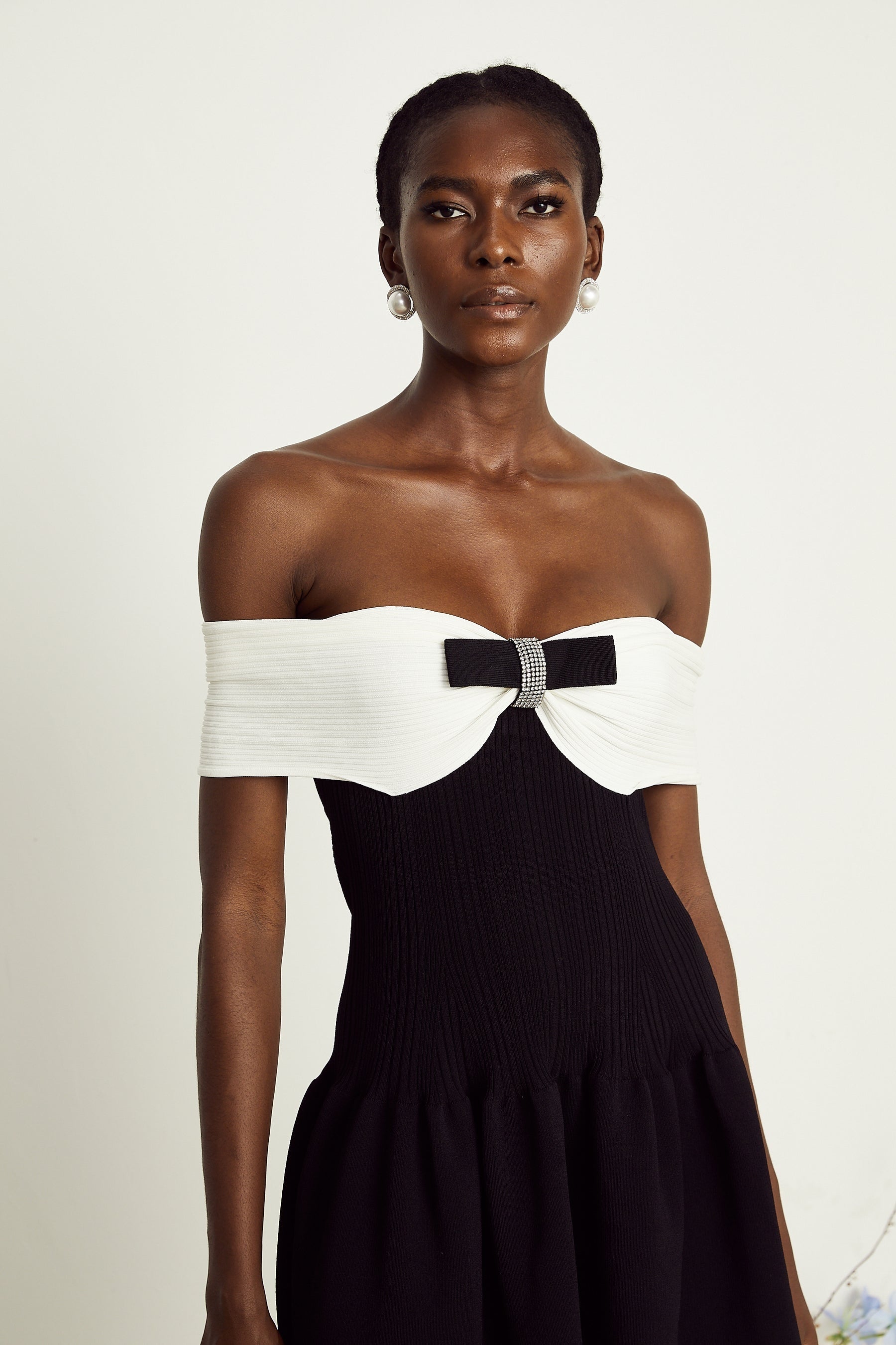 Angèle black offshoulder knitted mini dress