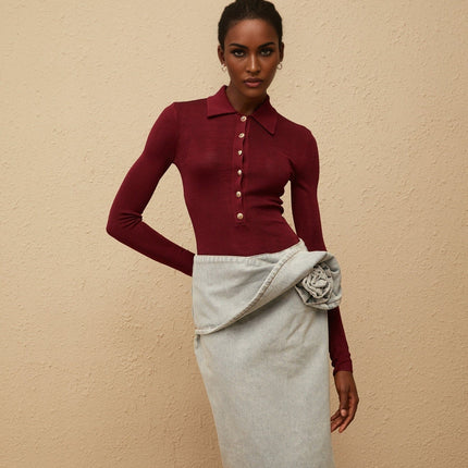 Angeliki Red Knit Bodysuit elegant sophisticated red notched lapels embossed gold-tone buttons knitted construction front button fastening long sleeves 95% Terylene fiber 5% Elastane timeless luxury