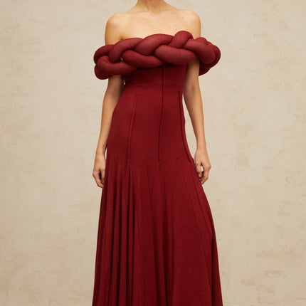 Angioletta Red Maxi Dress Knit Braid Godet Pleats Off-Shoulder Sleeveless Fitted Waistline Intricate Detailing Rear Zip Fastening 100% Terylene Fiber Composition