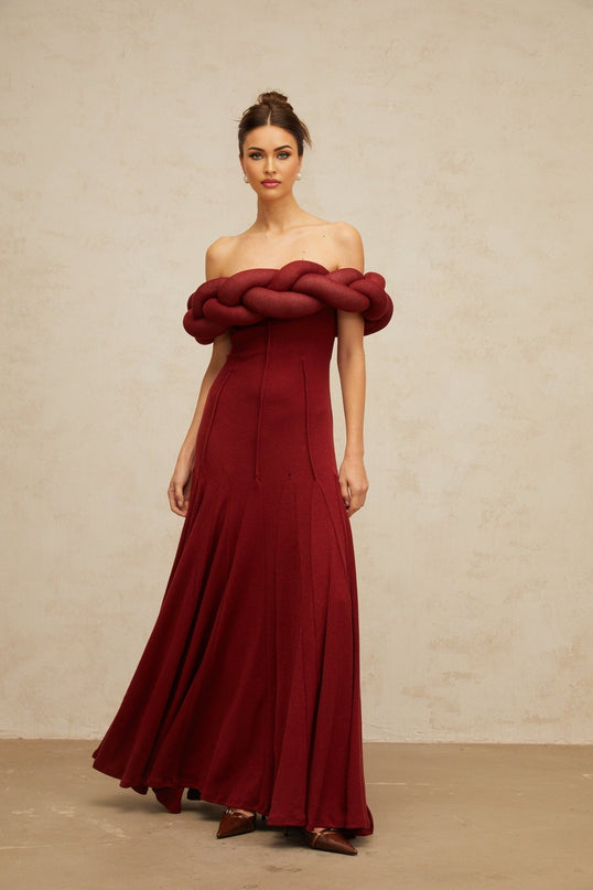 Angioletta Red Knit Braid Maxi Dress Godet Pleats Off-Shoulder Sleeveless Fitted Waistline Braid Detailing Rear Zip Fastening 100% Terylene Fiber Composition