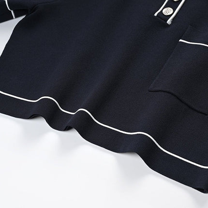 Anita Black Polo Top with Pleated Skirt and White Accents