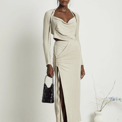 Annalisa Light Khaki Grey Skirt Top Set Matching Outfit Cupro Elastane Cowl Neck Long Sleeves Adjustable Pin-Buckle Halter Strap Low-Rise Silhouette Side Slit Gold-Tone Buckle Fastening Decorative Knot Calf-Length Hem