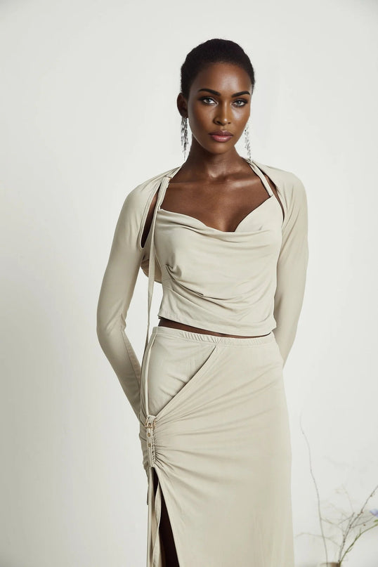 Annalisa Light Khaki Grey Skirt Top Set Matching Outfit Cupro Elastane Cowl Neck Long Sleeves Cut Out Design Adjustable Pin Buckle Halter Strap Low Rise Silhouette Gathered Effect Side Slit Gold Tone Buckle Fastening Decorative Knot Calf Length Hem