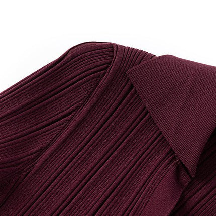 Annie wearing Deep Burgundy Ribbed Knit Bodycon Dress with Flared Cuffs and Button Details