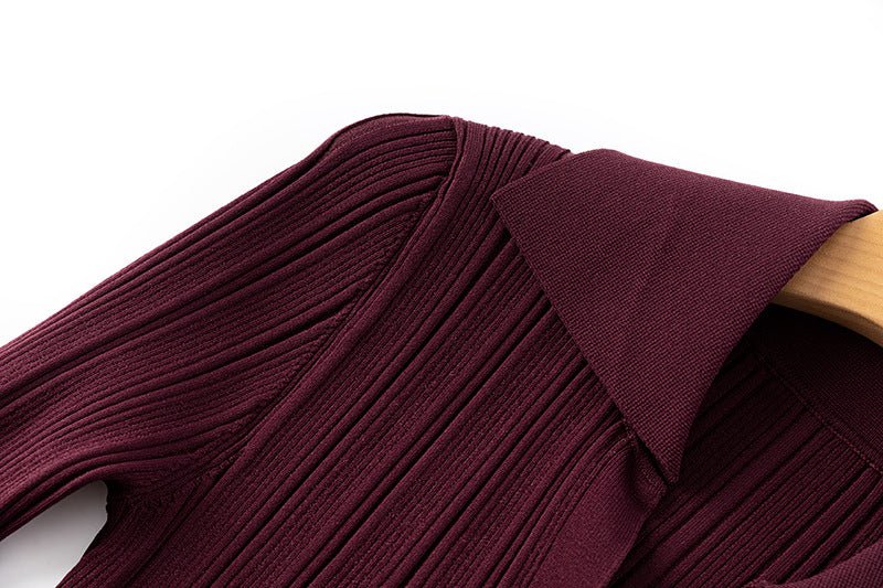 Annie wearing Deep Burgundy Ribbed Knit Bodycon Dress with Flared Cuffs and Button Details