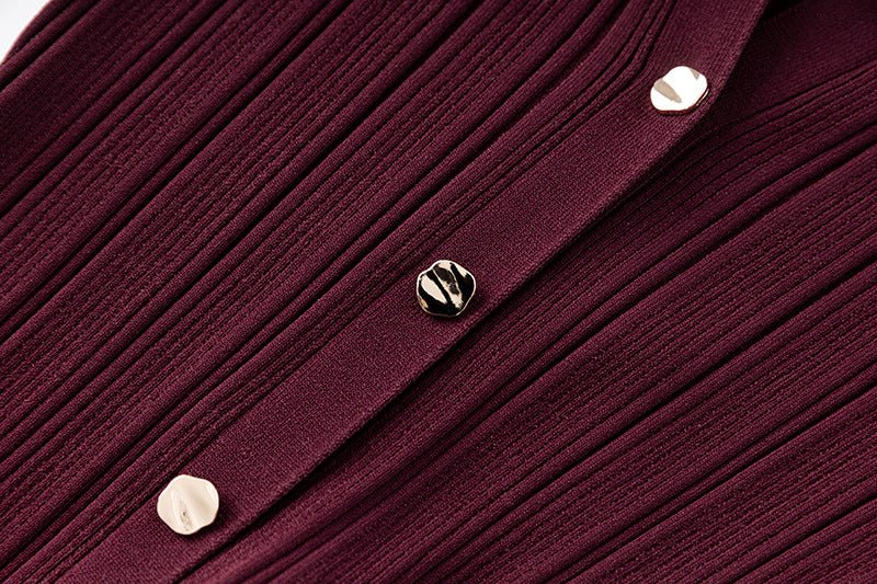 Annie wearing Deep Burgundy Ribbed Knit Bodycon Dress with Flared Hem and Button Details for Fall and Winter Formal Events