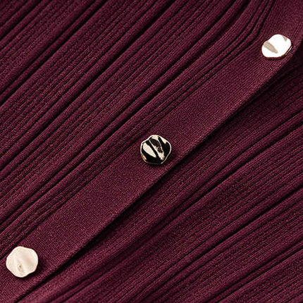 Annie wearing Deep Burgundy Ribbed Knit Bodycon Dress with Flared Hem and Button Details