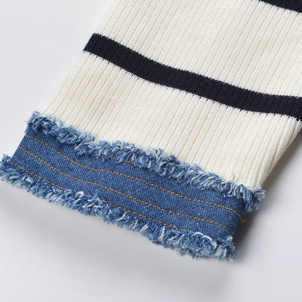 April wearing Multicolored Striped Cropped Box Top Cream Navy Denim Ribbed Casual Layering Piece with Frayed Edges and Button Closures