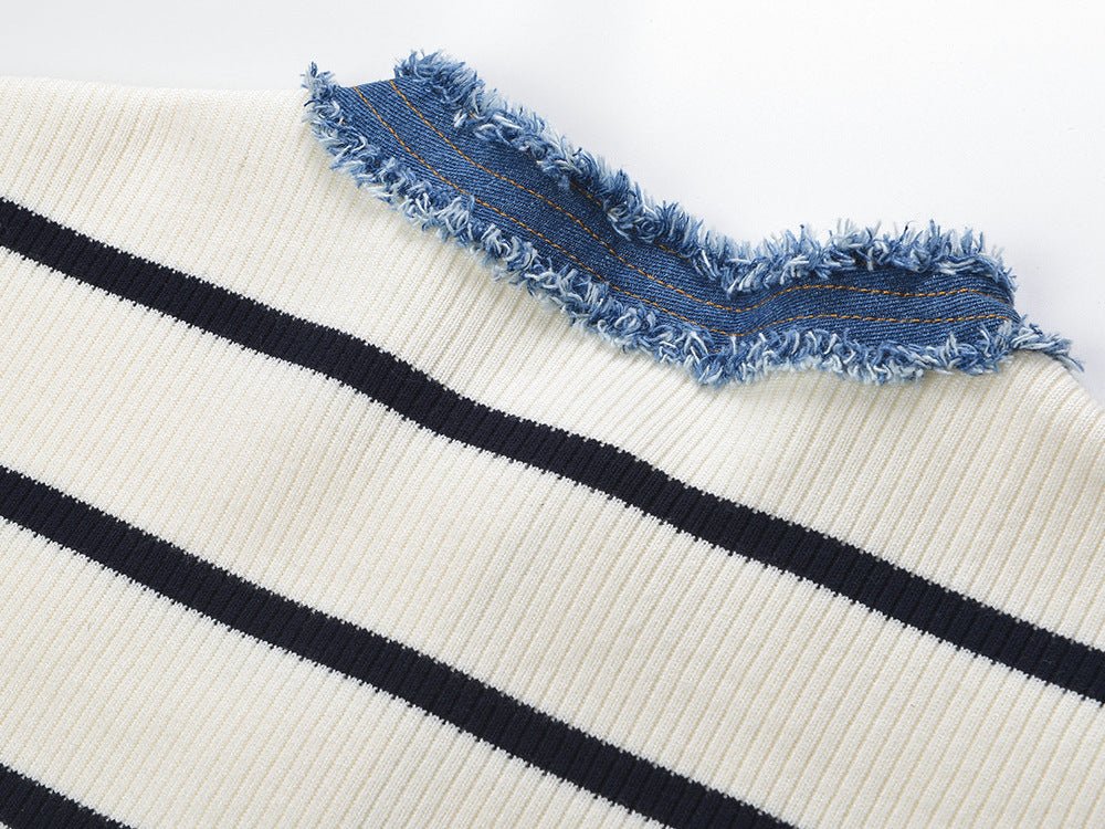 April wearing Multicolored striped cropped sweater with denim accents in Cream and navy, loose and comfortable fit for casual outings and weekend wear, retro-inspired and current fashion appeal