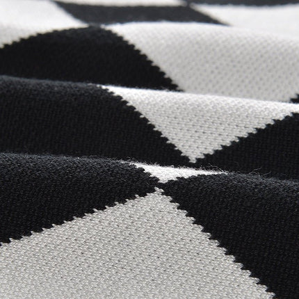 Aspen Black and White Harlequin Pattern Pencil Dress with Gold Button Accents