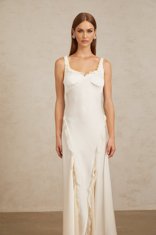 Assunta Maxi Dress in White with Ruffled Trim and Open Back Design