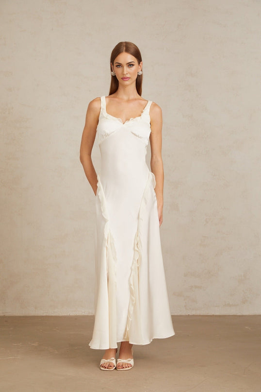 Assunta Maxi Dress White Ruffled Trim Open Back Sleeveless Side Zip Fastening 100% Terylene Fiber Special Occasion Elegant Sophisticated Chic Self-Tie Design Graceful Luxury Timeless Charm Scoop Neck Flowing Maxi Length Classic