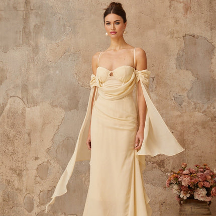 Assunta Neutrals Maxi Dress with sweetheart neckline and ruched detailing in luxurious chiffon, spaghetti straps, cold shoulder design, fitted waistline, flared hem, long slit sleeves, and self-tie detailing for special occasions