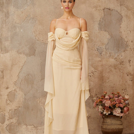 Assunta Neutrals Maxi Dress sweetheart neckline ruched detailing chiffon spaghetti straps cold shoulder fitted waistline flared hem slit sleeves self-tie detailing special occasions modern style timeless elegance