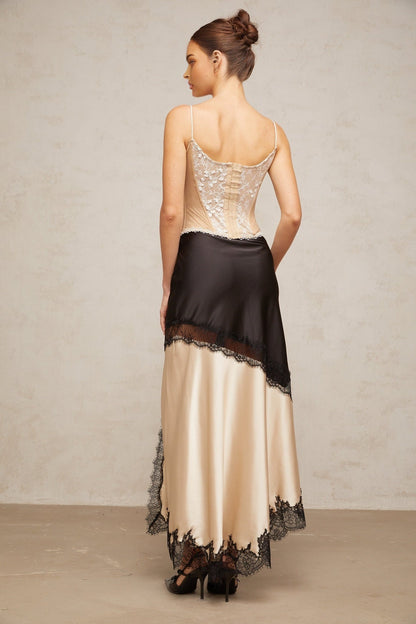 Asymmetric satin skirt with lace panel detailing named Raphaelle