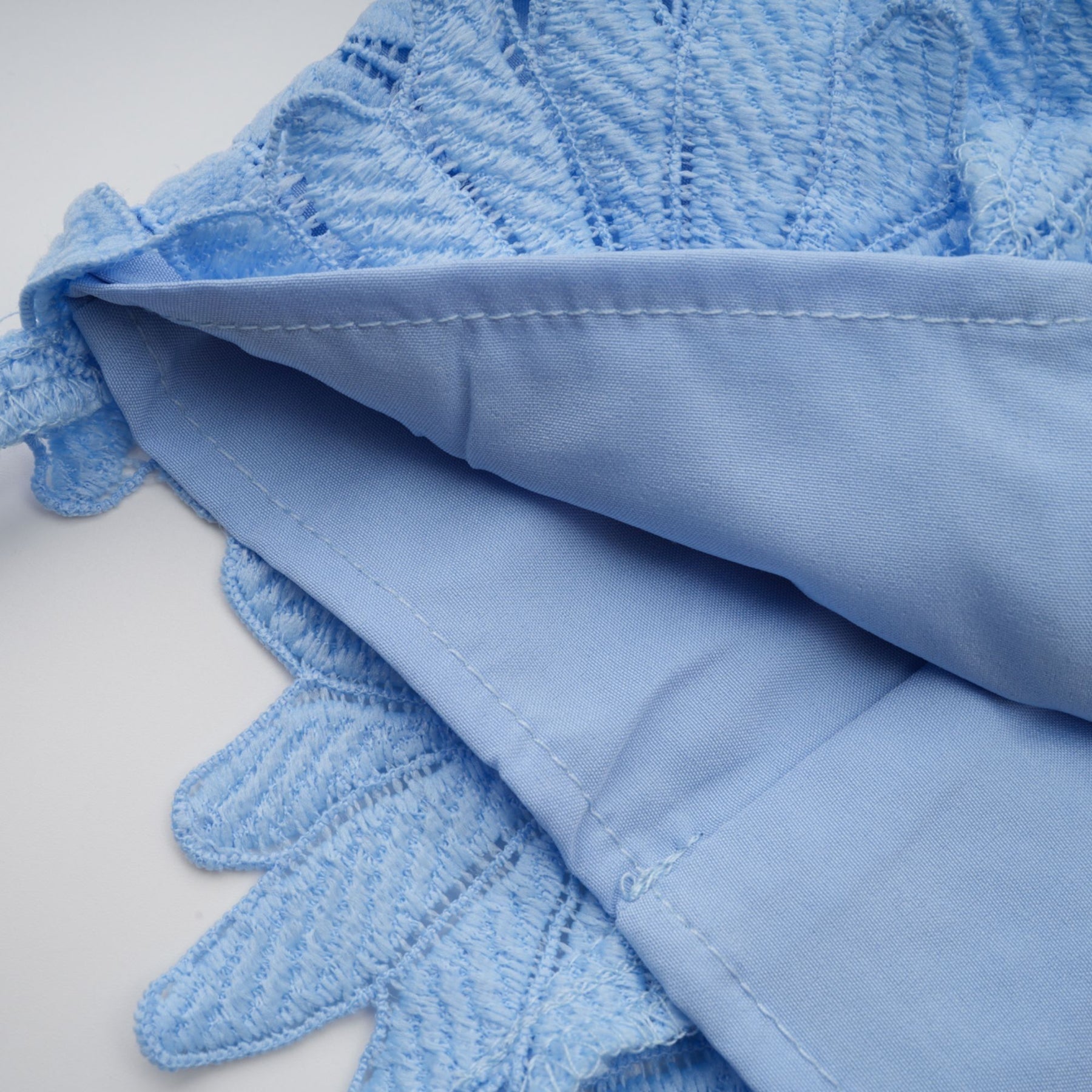 Audrey blue lace matching set featuring a top and skirt in guipure style