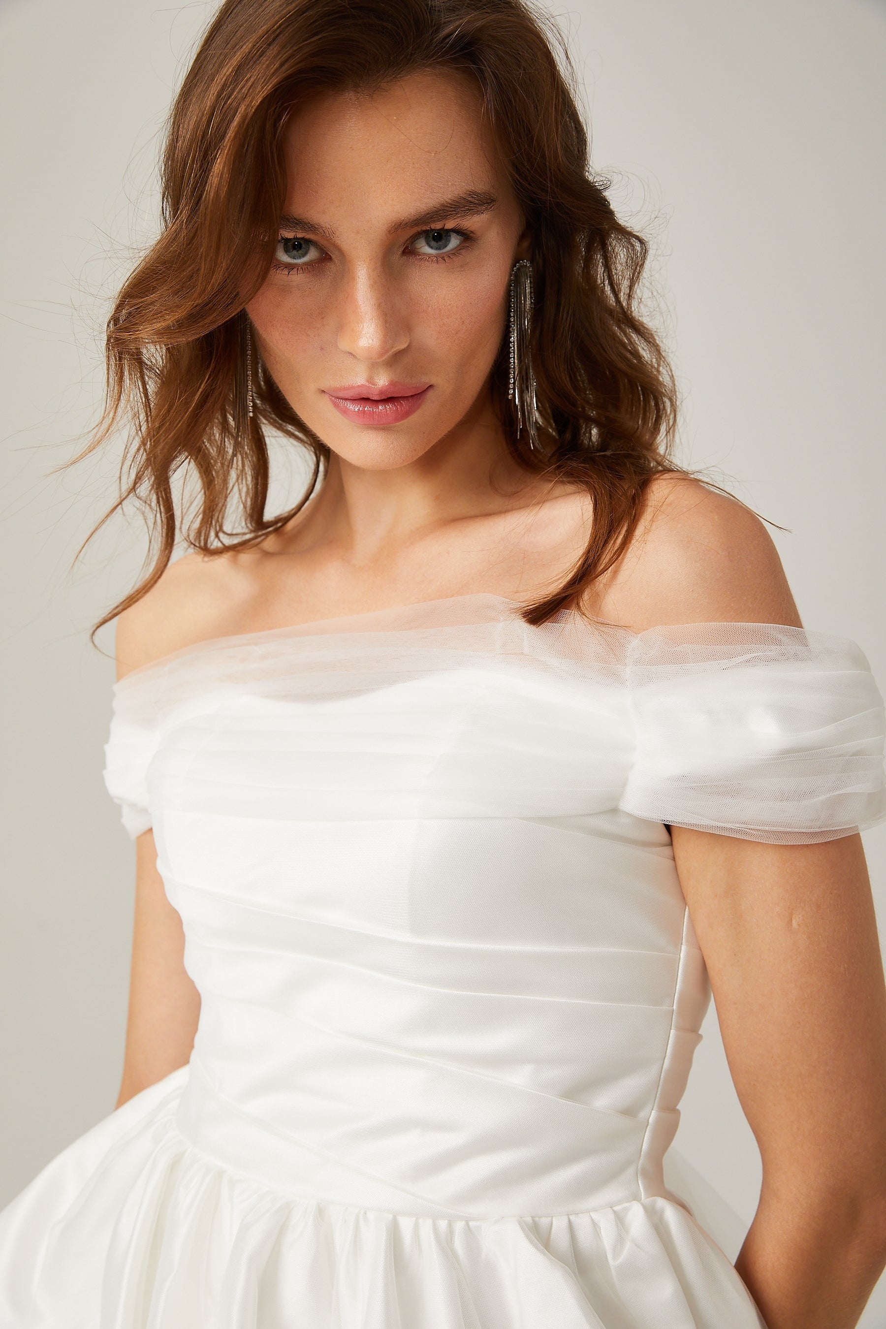 Aurore white offshoulder bowknot mini dress