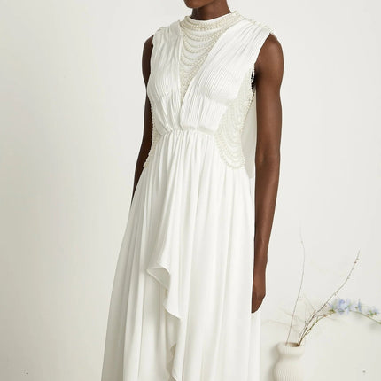 Autumn White Maxi Dress with Faux Pearl Embellishments and Asymmetric Pleats