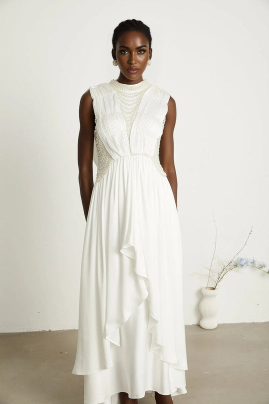 Autumn White Maxi Dress with Faux Pearl Embellishments and Asymmetric Pleats