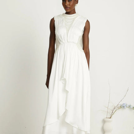 Autumn White Maxi Dress with Faux Pearl Embellishments and Asymmetric Pleats