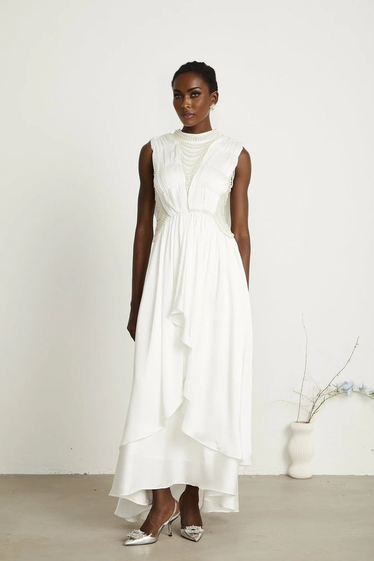 Autumn White Maxi Dress with Faux Pearl Embellishments and Asymmetric Pleats