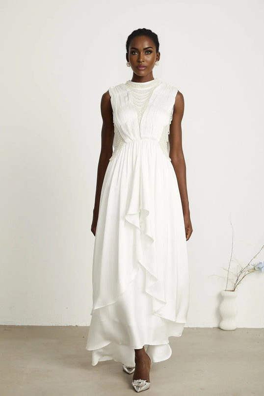 Autumn White Maxi Dress with Faux Pearl Embellishments and Asymmetric Pleats