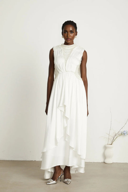Autumn White Maxi Dress with Faux Pearl Embellishments and Asymmetric Pleats