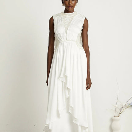 Autumn White Maxi Dress with Faux Pearl Embellishments and Asymmetric Pleats