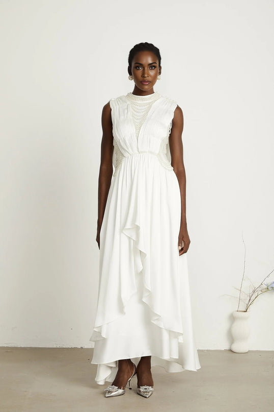 Autumn White Maxi Dress with Faux Pearl Embellishments and Asymmetric Pleats