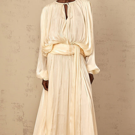 Barbara Maxi Dress in Neutrals Pleated Ruffled Glitter Long Sleeves Twist Neckline Shoulder Pads Semi-Sheer Regal Charm Luxurious Blend Elegant