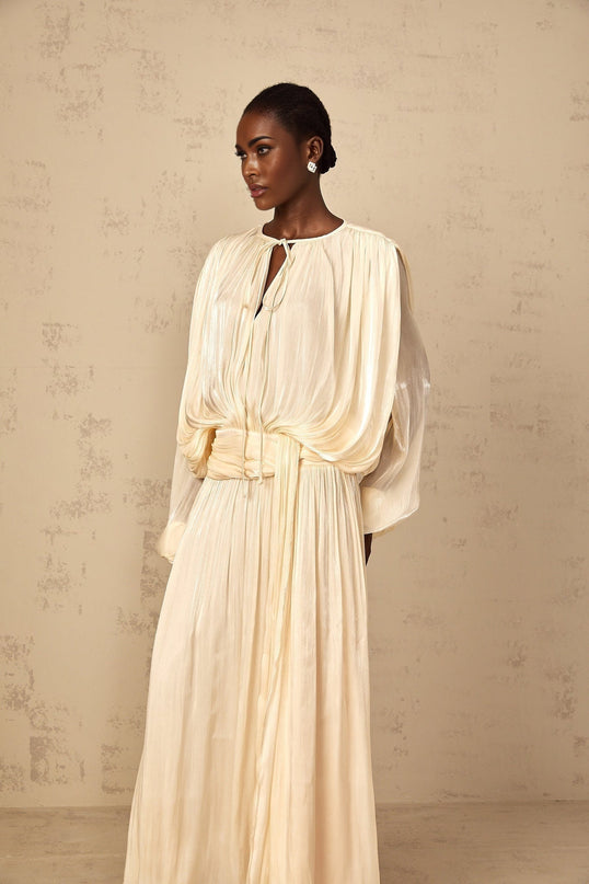 Barbara Maxi Dress in Neutrals Pleated Ruffled Glitter Long Sleeve Twist Neckline Shoulder Pads Drape Semi-Sheer Maxi Length Rear Button Side Zip Luxurious Blend Elegant