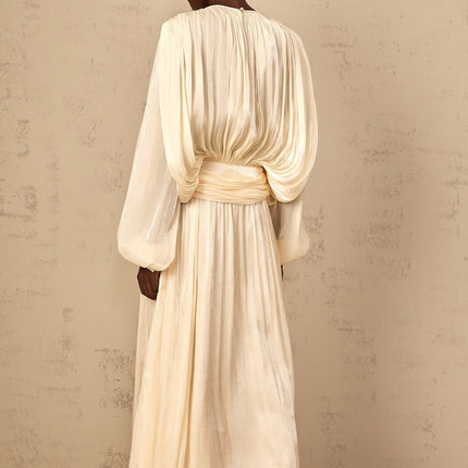 Barbara Maxi Dress in Neutrals Pleated Ruffled Glitter Long Sleeves Shoulder Pads Drape Semi-Sheer Twist Neckline Button Side Zip Fastening Luxury Blend Elegant