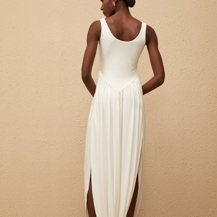 Barbara White Maxi Dress Terylene Fiber Sleeveless Scoop Neck Wide Straps Fitted Waistline Pleated Skirt Side Slits Semi-Sheer Elegant Chic Modern