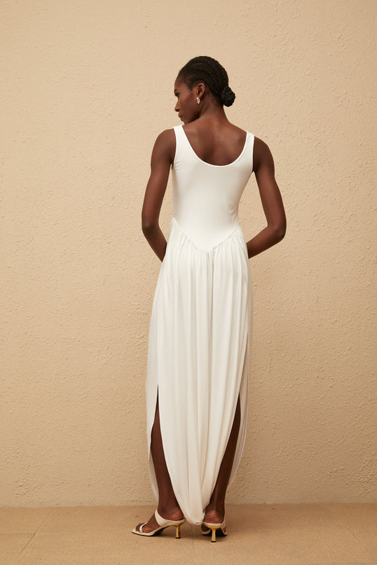 Barbara White Maxi Dress Terylene Fiber Sleeveless Scoop Neck Wide Straps Fitted Waistline Pleated Skirt Side Slits Semi-Sheer Elegant Chic Modern