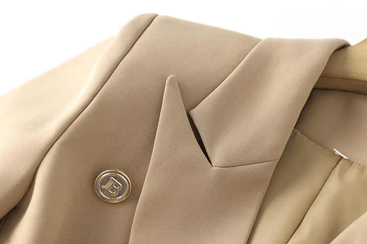 Beige double-breasted belted blazer with gold button accents
