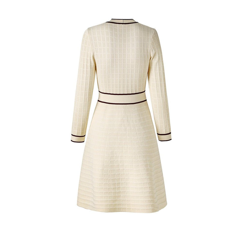 Beige knit A-line dress with bow-tie detail and gold-tone buttons