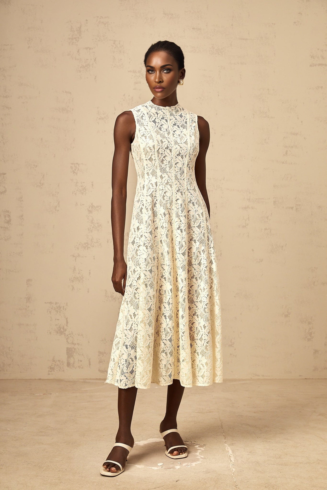 Beige midi dress with floral lace pattern and flared skirt design named Edelie